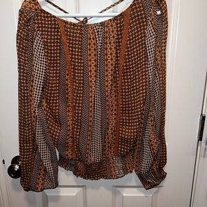 Sheer open down the arms blouse!  Never wore.